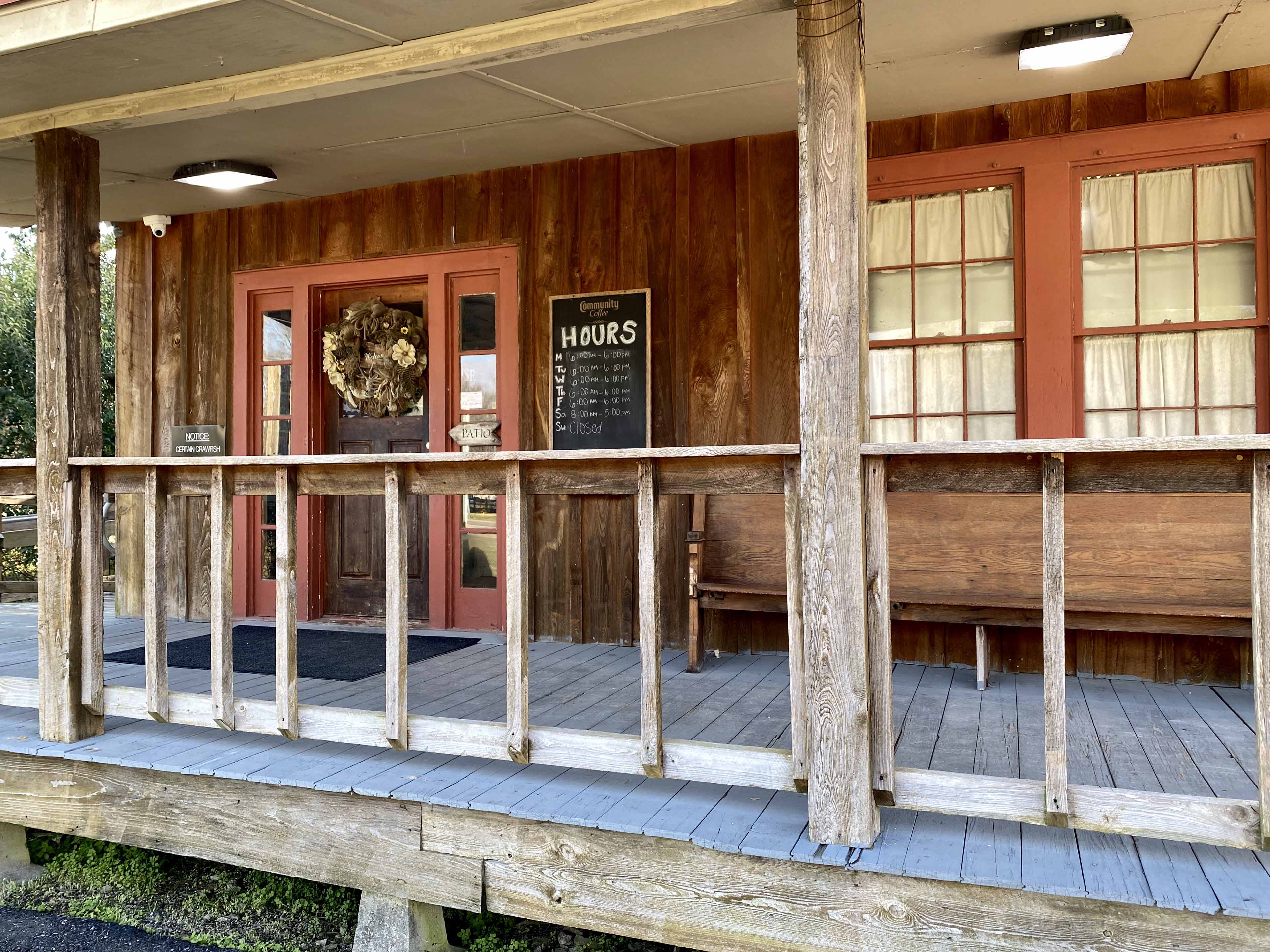 Day's Smokehouse Entrance with Bench